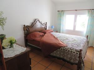 A bed or beds in a room at Casa Formosa