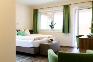 Voodi või voodid majutusasutuse Hotel Aichingerwirt toas