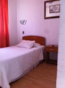 Postel nebo postele na pokoji v ubytování Hotel Altos de Atacama