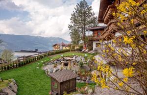 a garden in the backyard of a house at Landhaus Alpenjuwel in Sankt Johann im Pongau