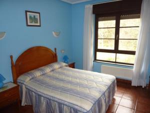 Ένα ή περισσότερα κρεβάτια σε δωμάτιο στο Hotel Benzua +18 φωτογραφίες