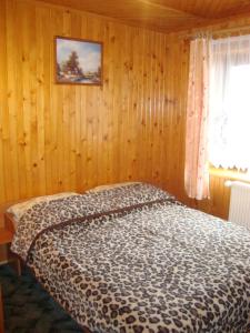 Postel nebo postele na pokoji v ubytování Willa Turnia