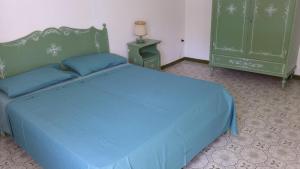 Postel nebo postele na pokoji v ubytování Villa L'isola