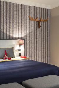 Postel nebo postele na pokoji v ubytování Araucaria Hotel & Spa