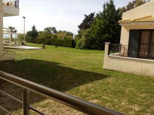 Jardí fora de Coralli Hotel