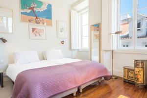 Cama o camas de una habitación en The 3 Sisters Lisbon