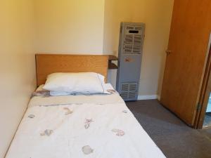 Postel nebo postele na pokoji v ubytování Hat Motel