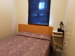 Postel nebo postele na pokoji v ubytování Hat Motel