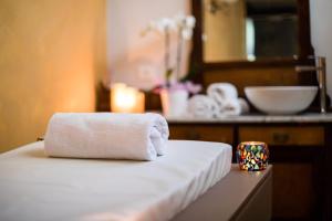 Ένα ή περισσότερα κρεβάτια σε δωμάτιο στο Hotel Collini
