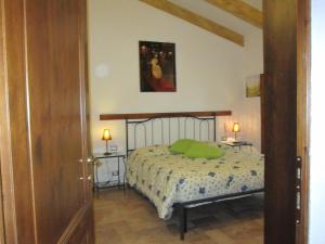 Ένα ή περισσότερα κρεβάτια σε δωμάτιο στο Agriturismo Il Colto