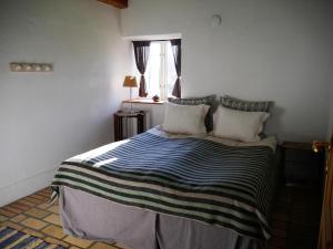 Letto o letti in una camera di Onkel Enkels Pensionat