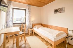 Postel nebo postele na pokoji v ubytování Hotel Bettstadl + 11 fotografií