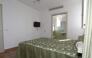 Postel nebo postele na pokoji v ubytování Hotel Lafon - face à l'Océan