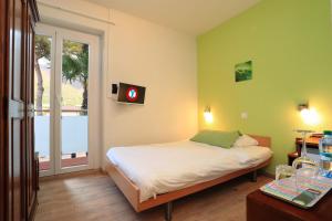 Letto o letti in una camera di Osteria Ticino by Ketty & Tommy