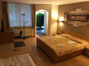 Letto o letti in una camera di Hotel Korfu