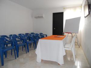 Μια τηλεόραση ή/και κέντρο ψυχαγωγίας στο Hotel Cosmos Sincelejo