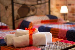 Postel nebo postele na pokoji v ubytování Rocca Pinta Guest House