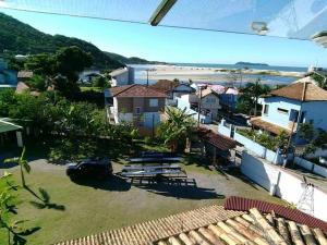 a view from the balcony of a house at Pousada Maktub in Guarda do Embaú