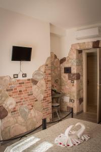 TV a/nebo společenská místnost v ubytování Rocca Pinta Guest House