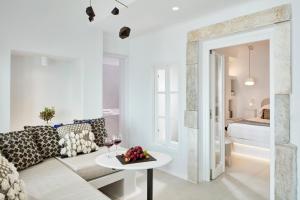 Giường trong phòng chung tại Cosmopolitan Suites - Small Luxury Hotels of the World