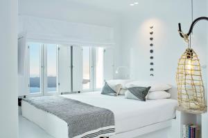 Giường trong phòng chung tại Cosmopolitan Suites - Small Luxury Hotels of the World