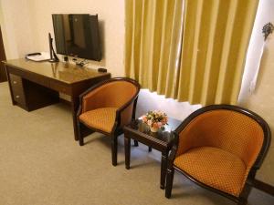 Zona de estar de Wuzhou Hotel