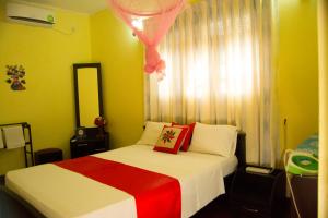 Letto o letti in una camera di Sigiri Sithru Home Stay