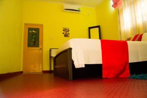 Letto o letti in una camera di Sigiri Sithru Home Stay