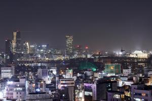 a night view of a city with lights at 9 Brick Hotel in Seoul