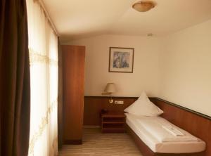Postel nebo postele na pokoji v ubytování AS Hotel + 29 fotografií