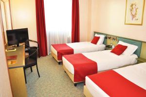 Postel nebo postele na pokoji v ubytování Antony Hotel - Venice Airport