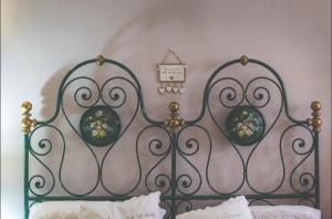 Postel nebo postele na pokoji v ubytování Cantina del Convento Maison
