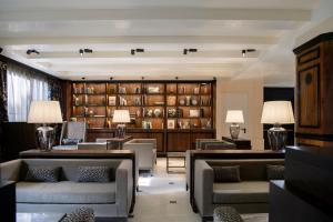 a lobby of a hotel with couches and chairs at Palazzo Veneziano - Venice Collection in Venice