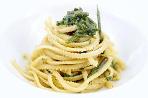 a pile of pasta on a plate with a fork at Hotel Mazzurco in Cesar&ograve;