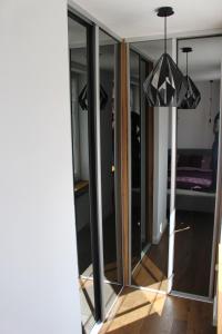 Posteľ alebo postele v izbe v ubytovaní Apartament Targ Rybny LUXON Gdansk