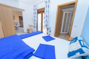 Postel nebo postele na pokoji v ubytování Apartments San Jozef + 36 fotografií
