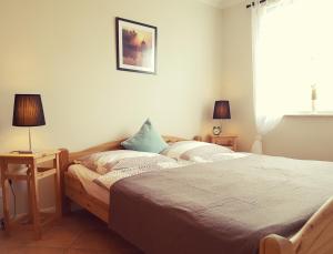 Ferienwohnung Hugo tesisinde bir odada yatak veya yataklar