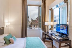 Cama ou camas em um quarto em Internazionale Domus