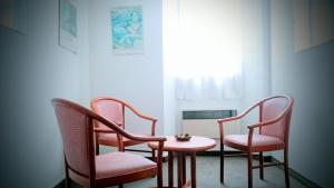 Posezení v ubytování Hôtel Royal