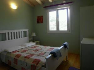 Postel nebo postele na pokoji v ubytování Shambala Apartments