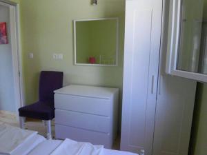 Postel nebo postele na pokoji v ubytování Shambala Apartments