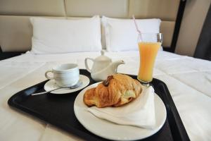 Možnosti snídaně pro hosty v ubytování Hotel Vila e Arte City Center