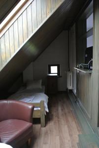 Cama o camas de una habitación en Zajazd pod Zamkiem