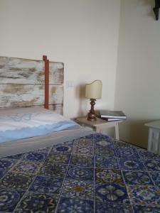 Cama o camas de una habitación en Il Fienile Holiday Home