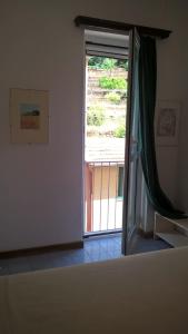 Postel nebo postele na pokoji v ubytování Splendido Affaccio