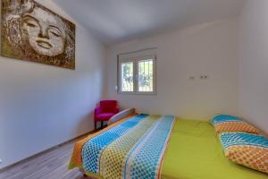 a bedroom with a bed and a window at Yokana Villa & Pool in Virpazar +52 photos