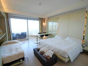 Кровать или кровати в номере Hotel Premier & Suites - Premier Resort