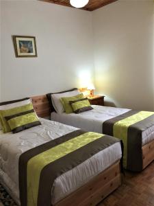 Säng eller sängar i ett rum på Casa do Areal