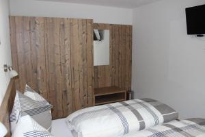 Postel nebo postele na pokoji v ubytování Haus Bichali