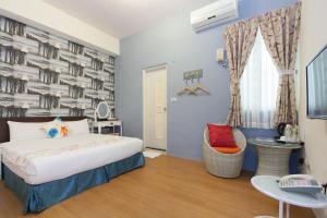 Katil atau katil-katil dalam bilik di Sweet B&B 幸福微甜民宿